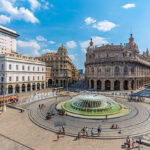 Genoa, Italy - September 10, 2016: In this a typical corner of Genova, the square Piazza de Ferrari. Genoa is a popular seaside city for both the port and the aquarium, both for typical Caruggi, narrow alleys of the old town. The upper part of the city is finally very rich with stately palaces, great churches and stately squares.